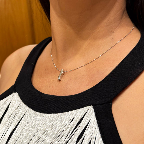 Cadena con colgante en oro blanco 18k con diamantes