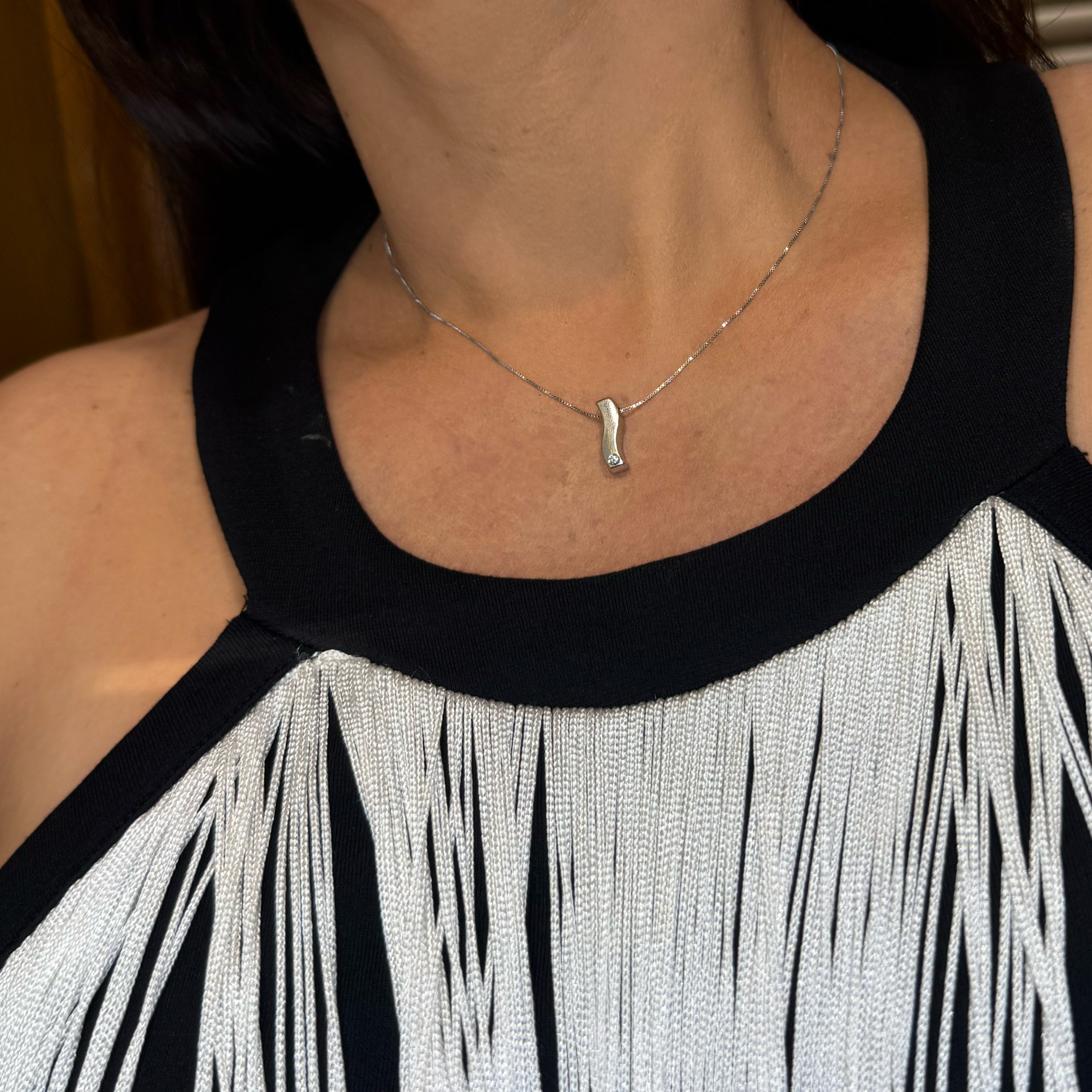 Cadena con colgante en oro blanco 18k con diamantes