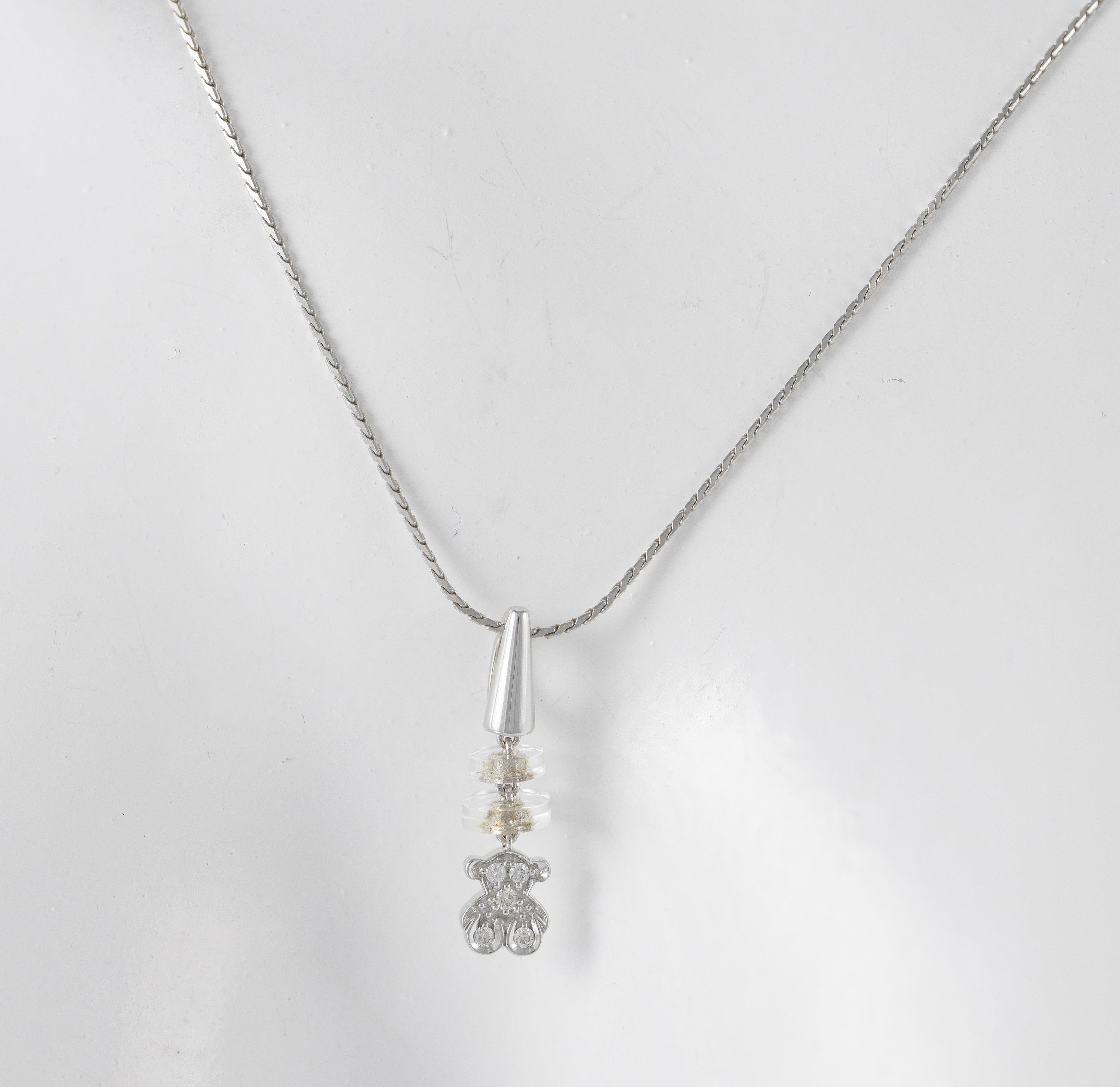 Colgante Tous en oro blanco 18k y diamantes motivo oso Tous Bear