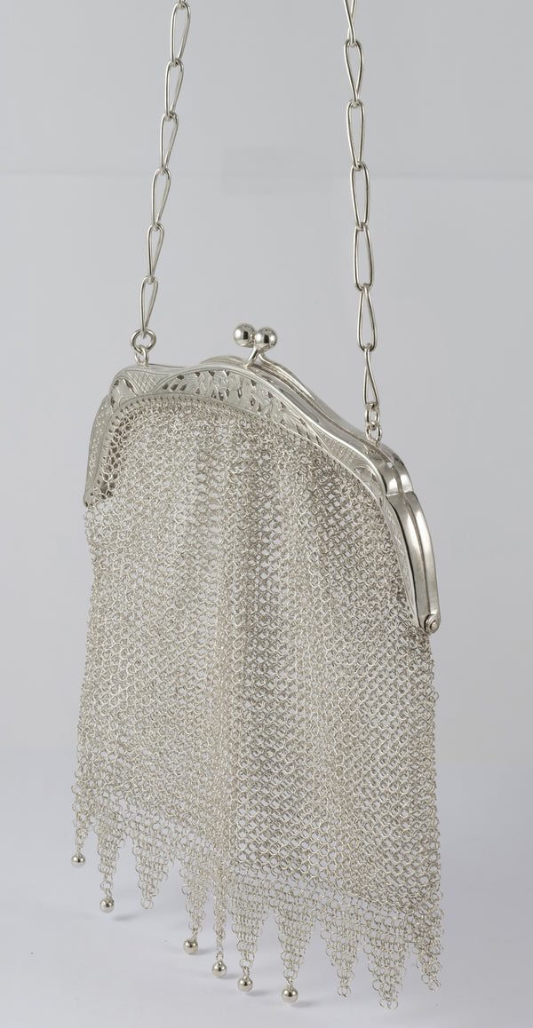 Cartera antigua de plata