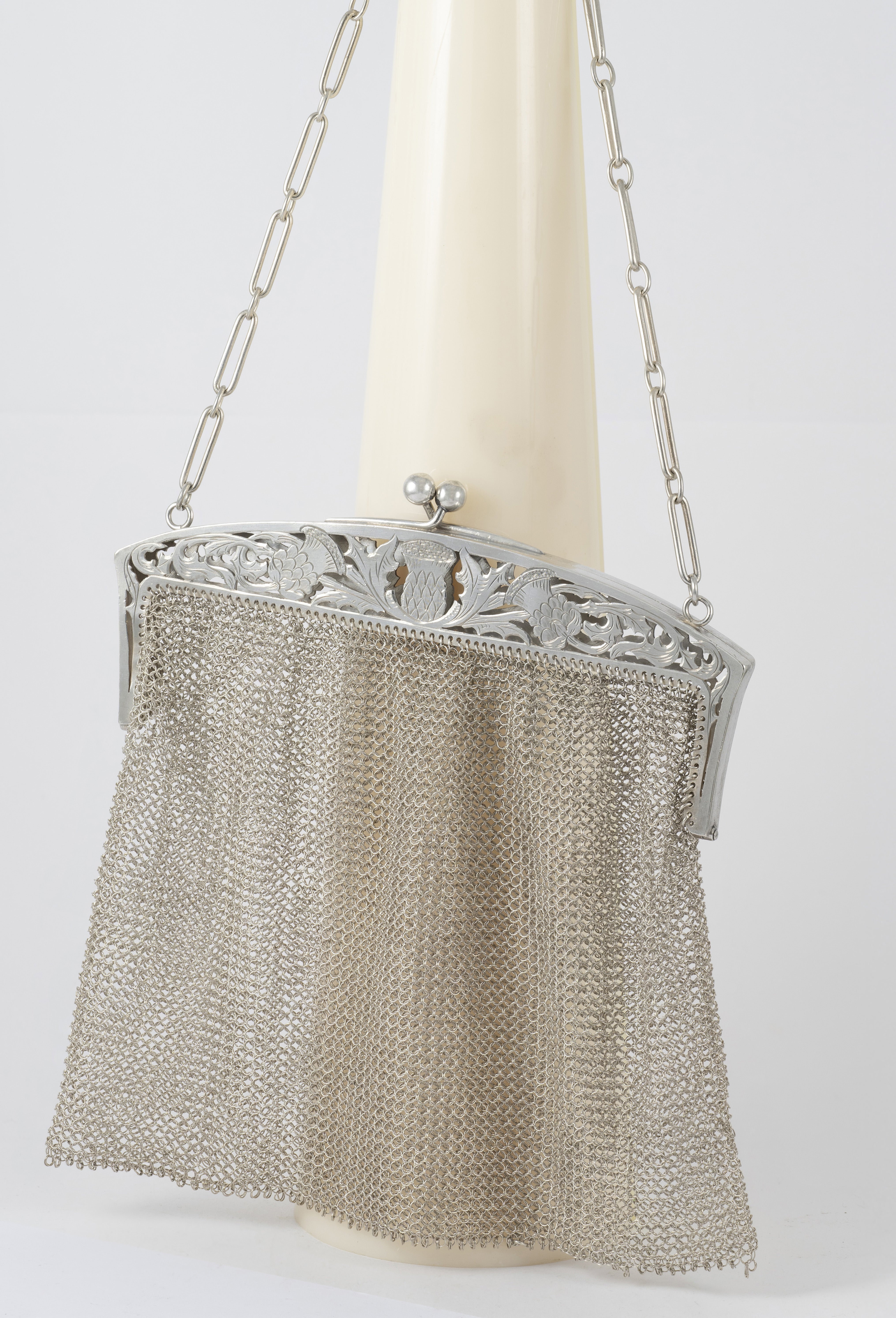 Cartera antigua de plata