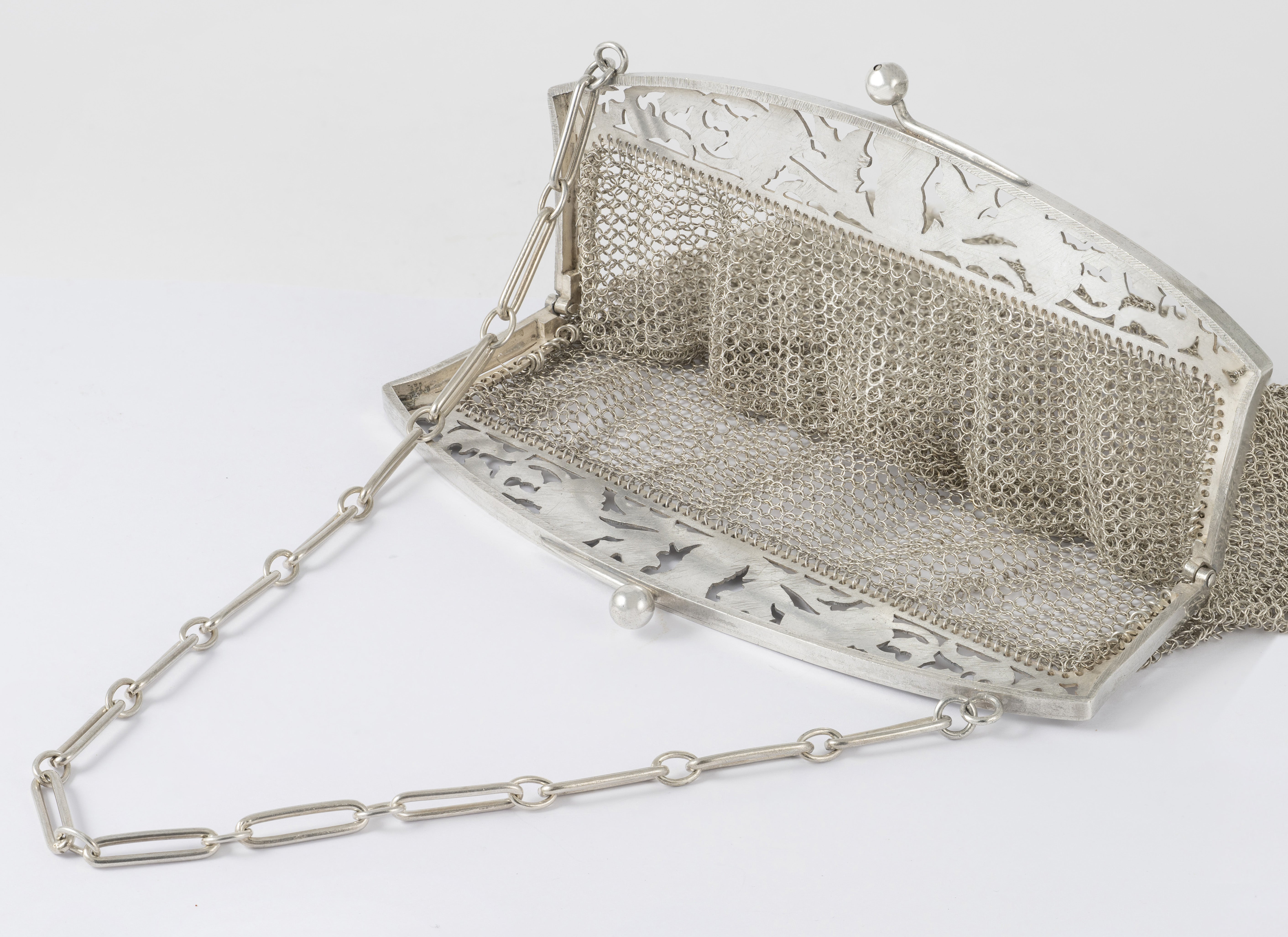 Cartera antigua de plata