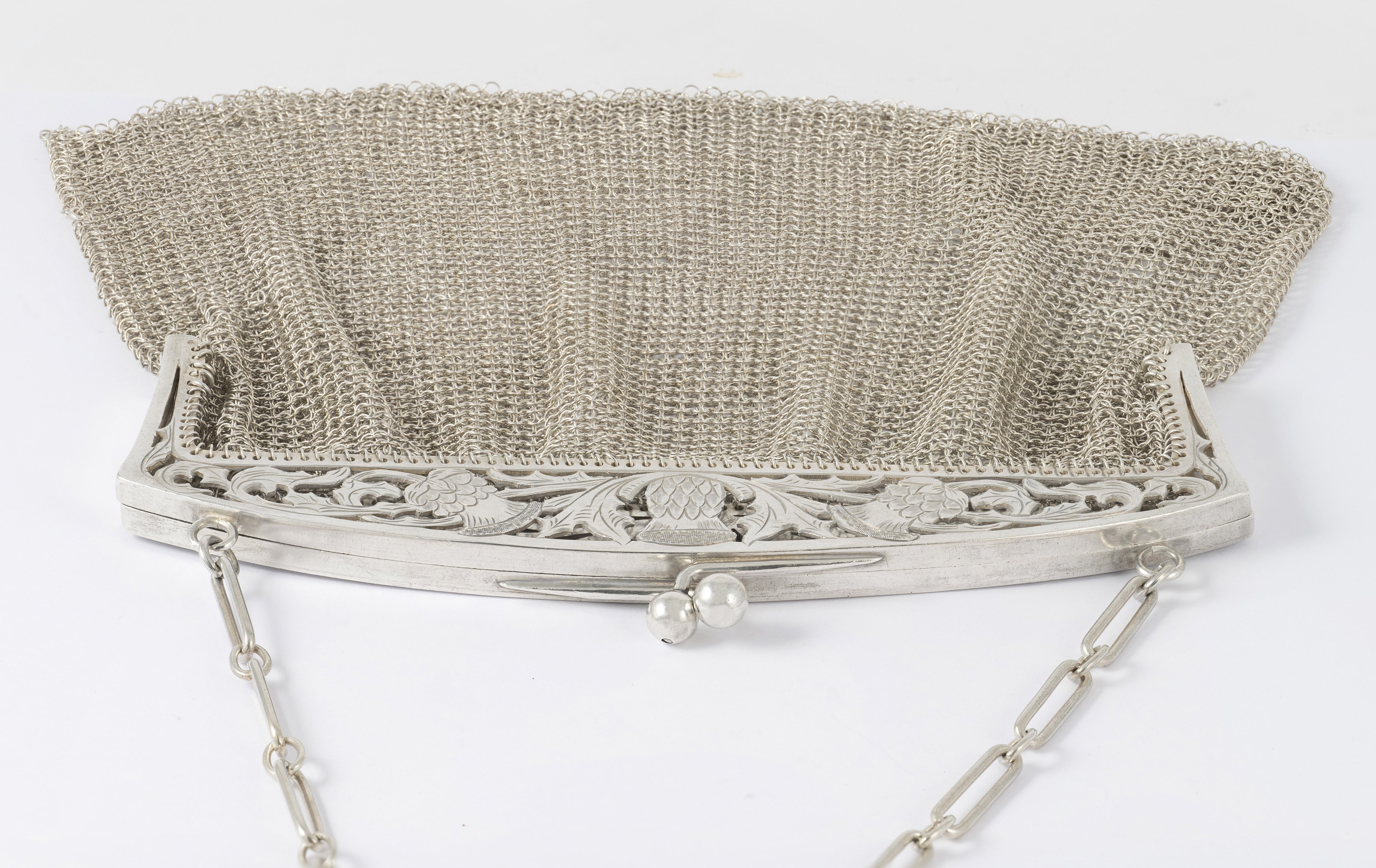 Cartera antigua de plata