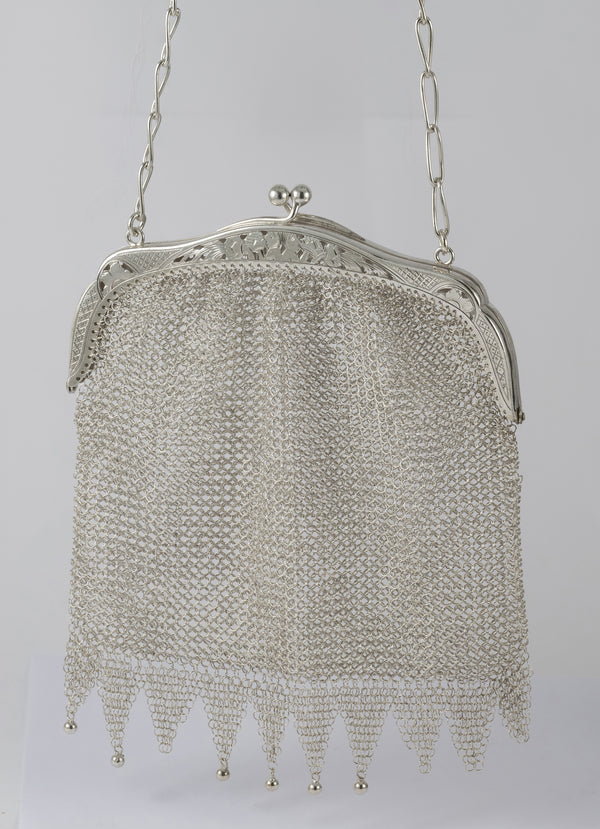 Cartera antigua de plata