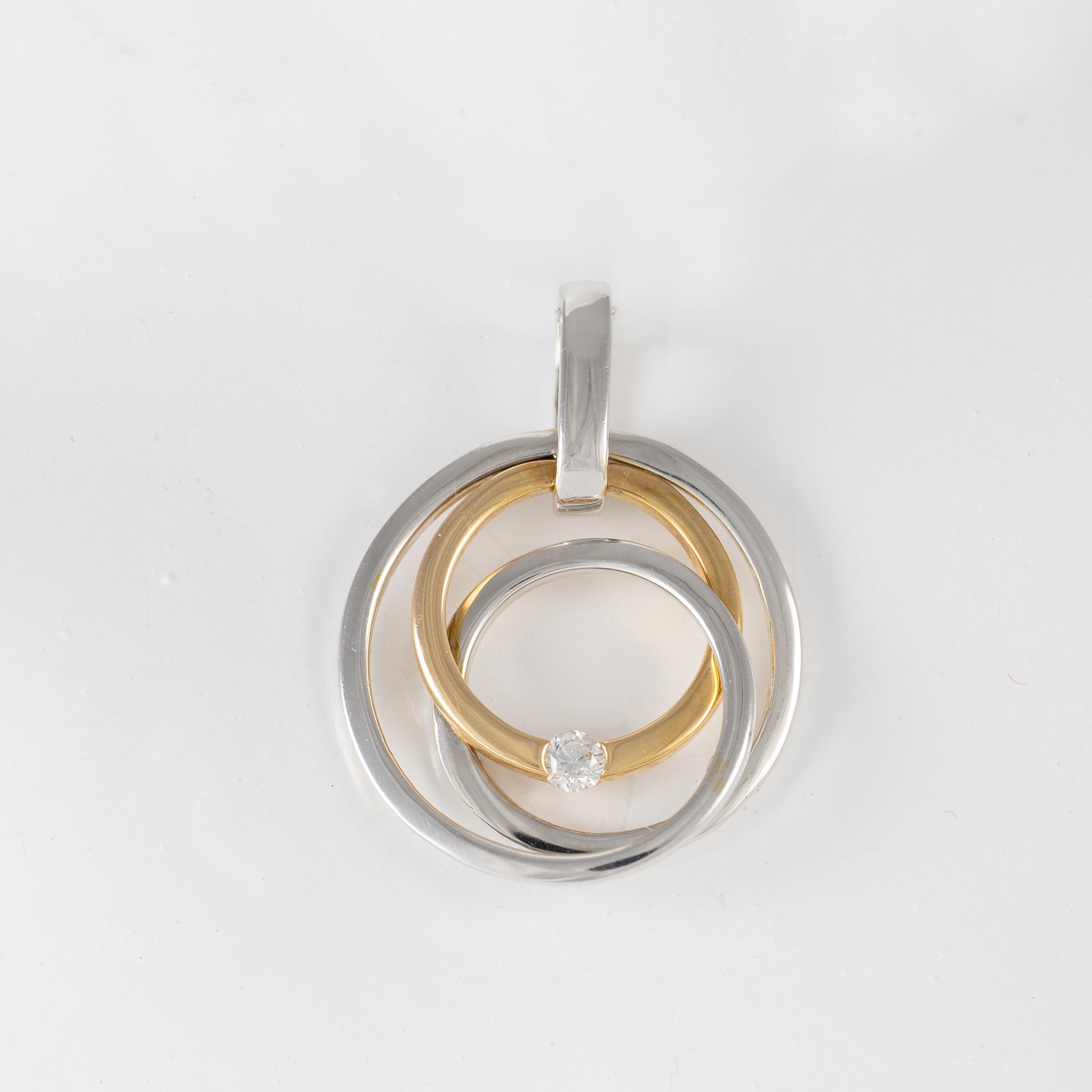 Colgante en oro amarillo y blanco 18k con brillante