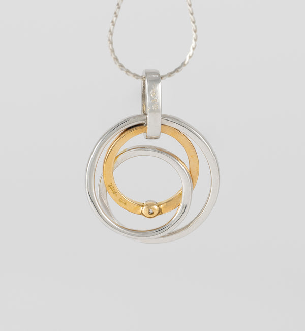 Colgante en oro amarillo y blanco 18k con brillante