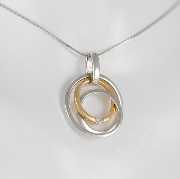 Colgante en oro amarillo y blanco 18k con brillante