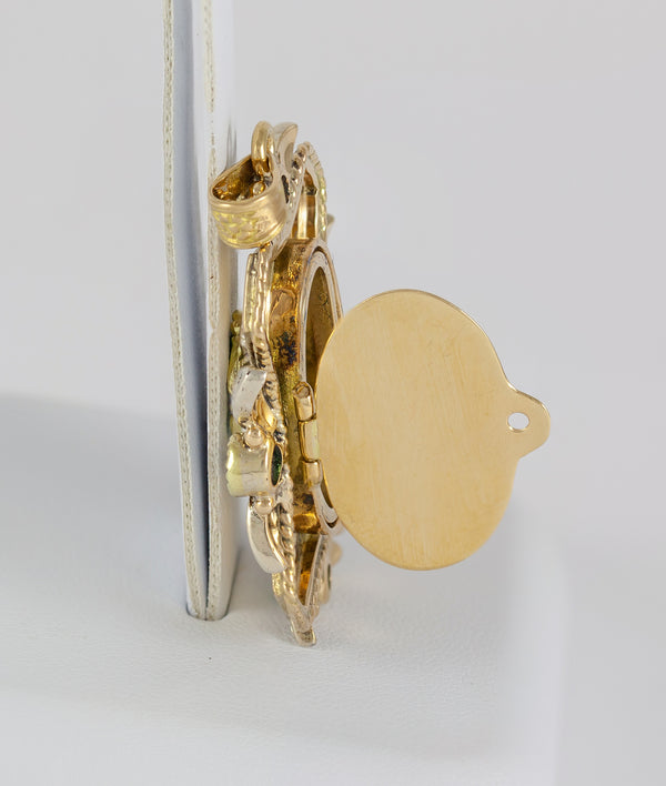 Colgante antiguo en oro amarillo 18k con diamantes y esmeraldas