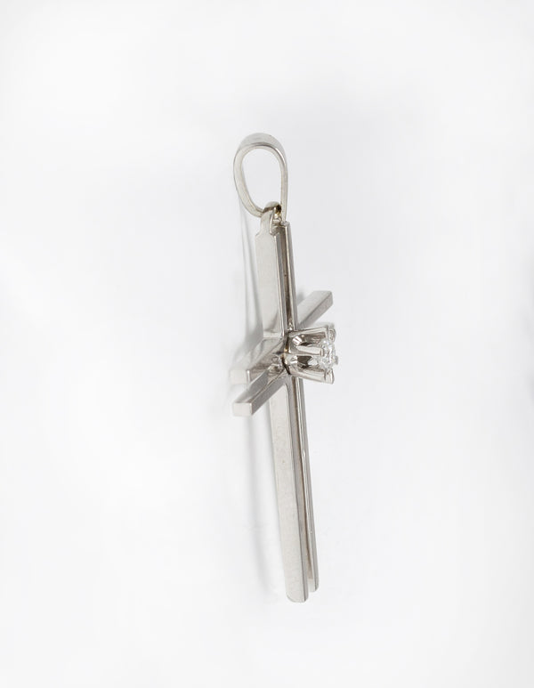 Colgante cruz en oro blanco 18k con brillante