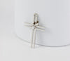 Colgante cruz en oro blanco 18k con brillante