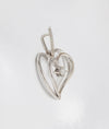 Colgante corazón en oro blanco 18k con brillante