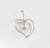 Colgante corazón en oro blanco 18k con brillante