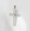Colgante cruz en oro blanco 18k con brillante