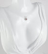 Colgante en oro blanco 18k con rubí y brillantes