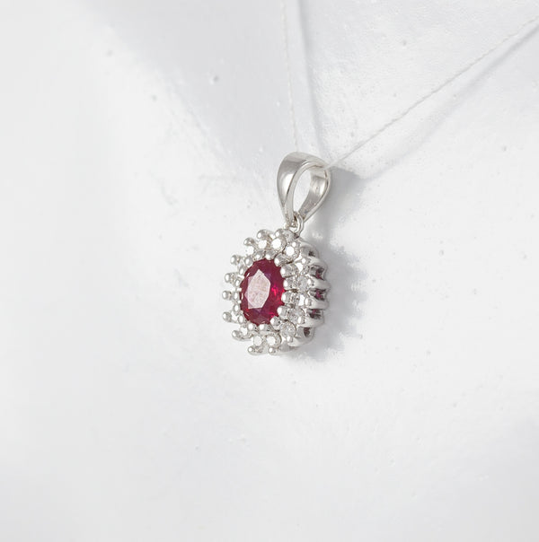 Colgante en oro blanco 18k con rubí y brillantes