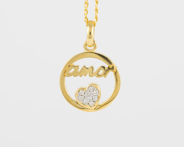Colgante Tous Amor de oro amarillo 18k y diamantes Crossword
