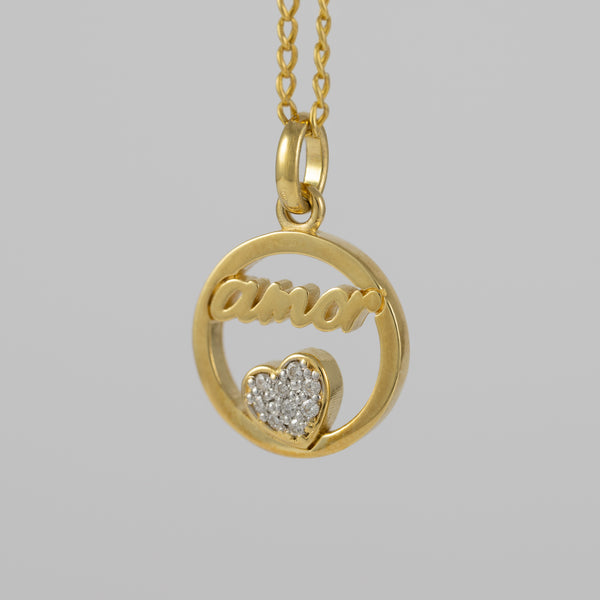 Colgante Tous Amor de oro amarillo 18k y diamantes Crossword