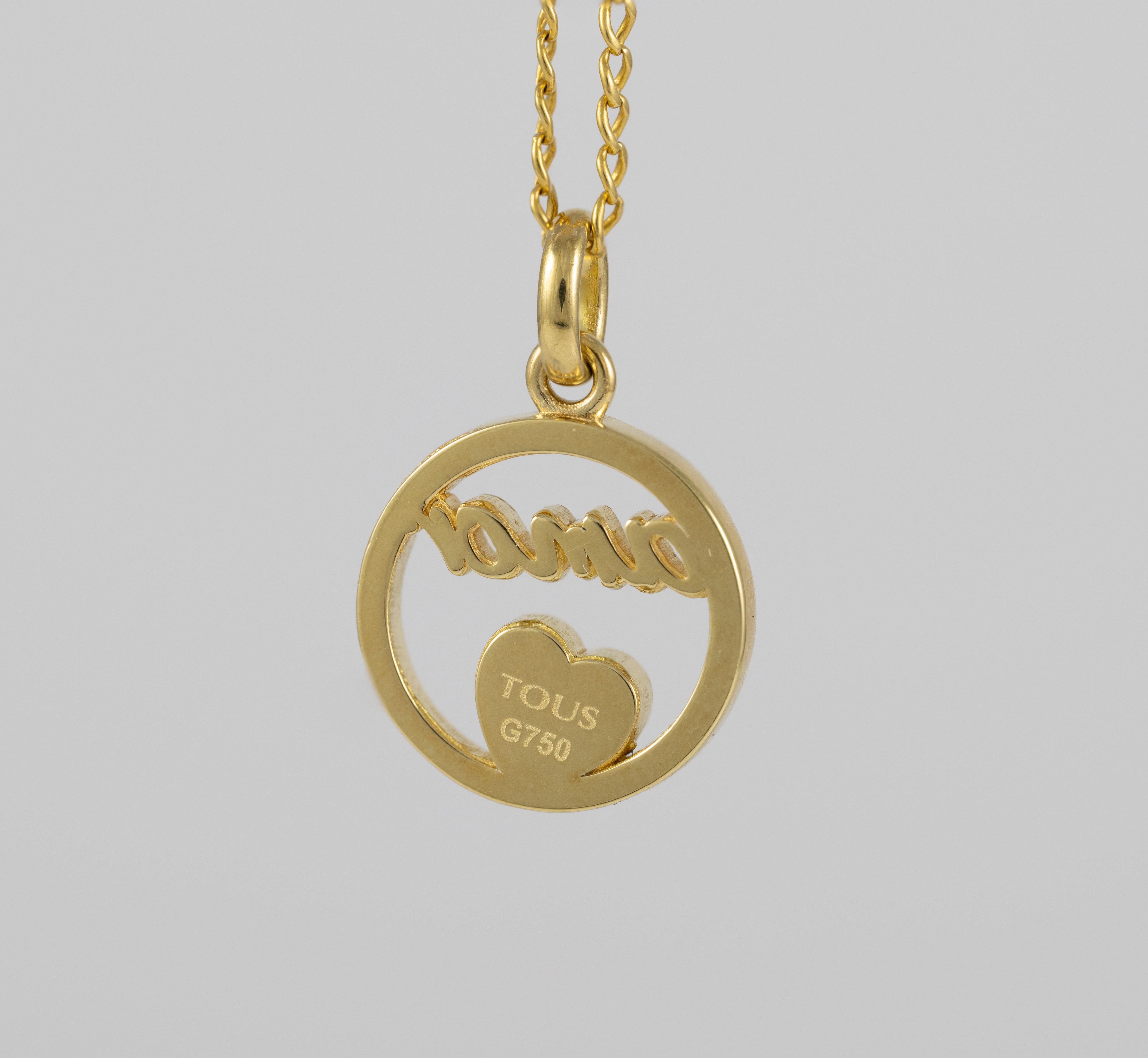 Colgante Tous Amor de oro amarillo 18k y diamantes Crossword