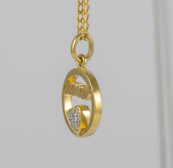 Colgante Tous Amor de oro amarillo 18k y diamantes Crossword