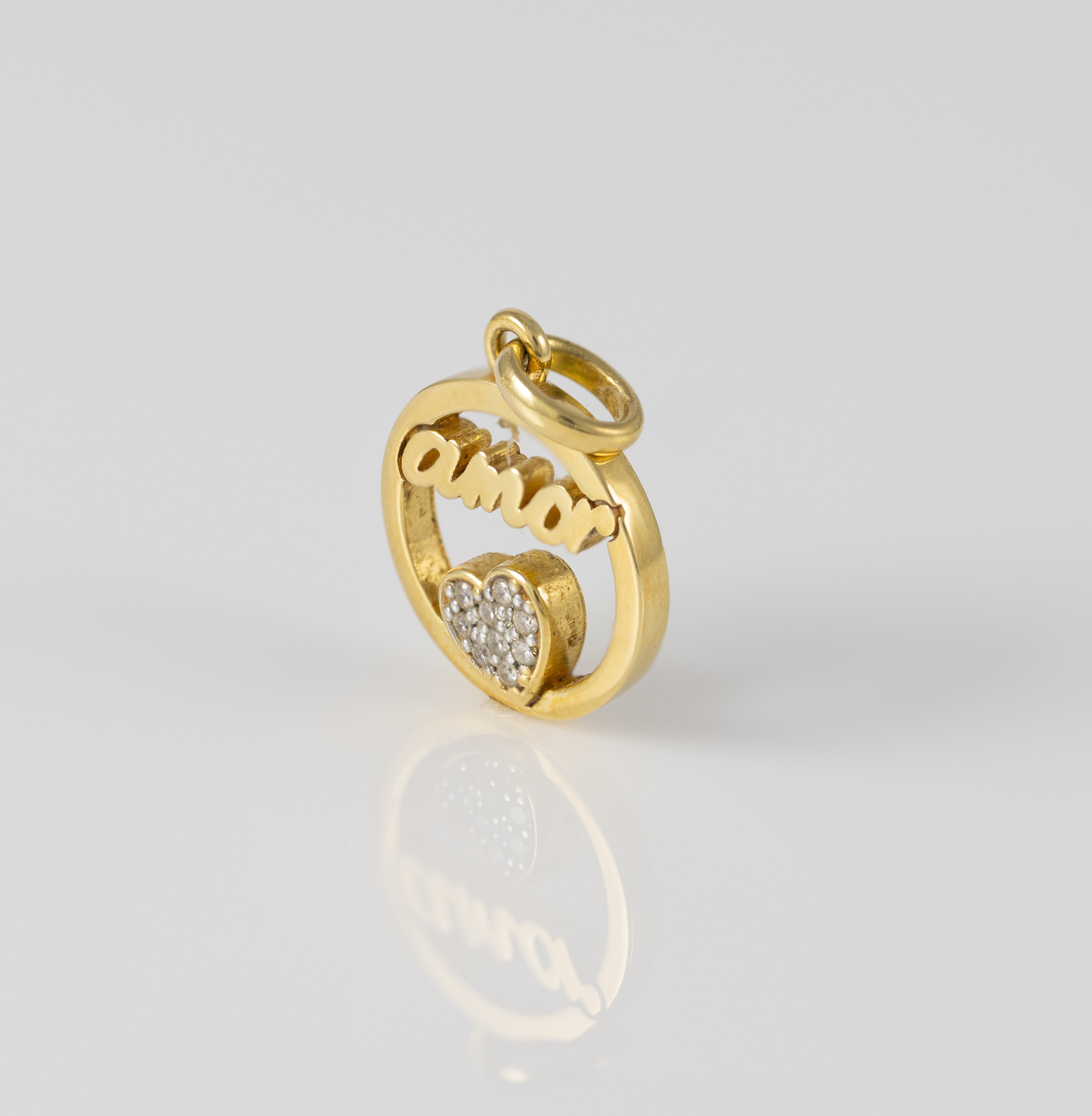 Colgante Tous Amor de oro amarillo 18k y diamantes Crossword