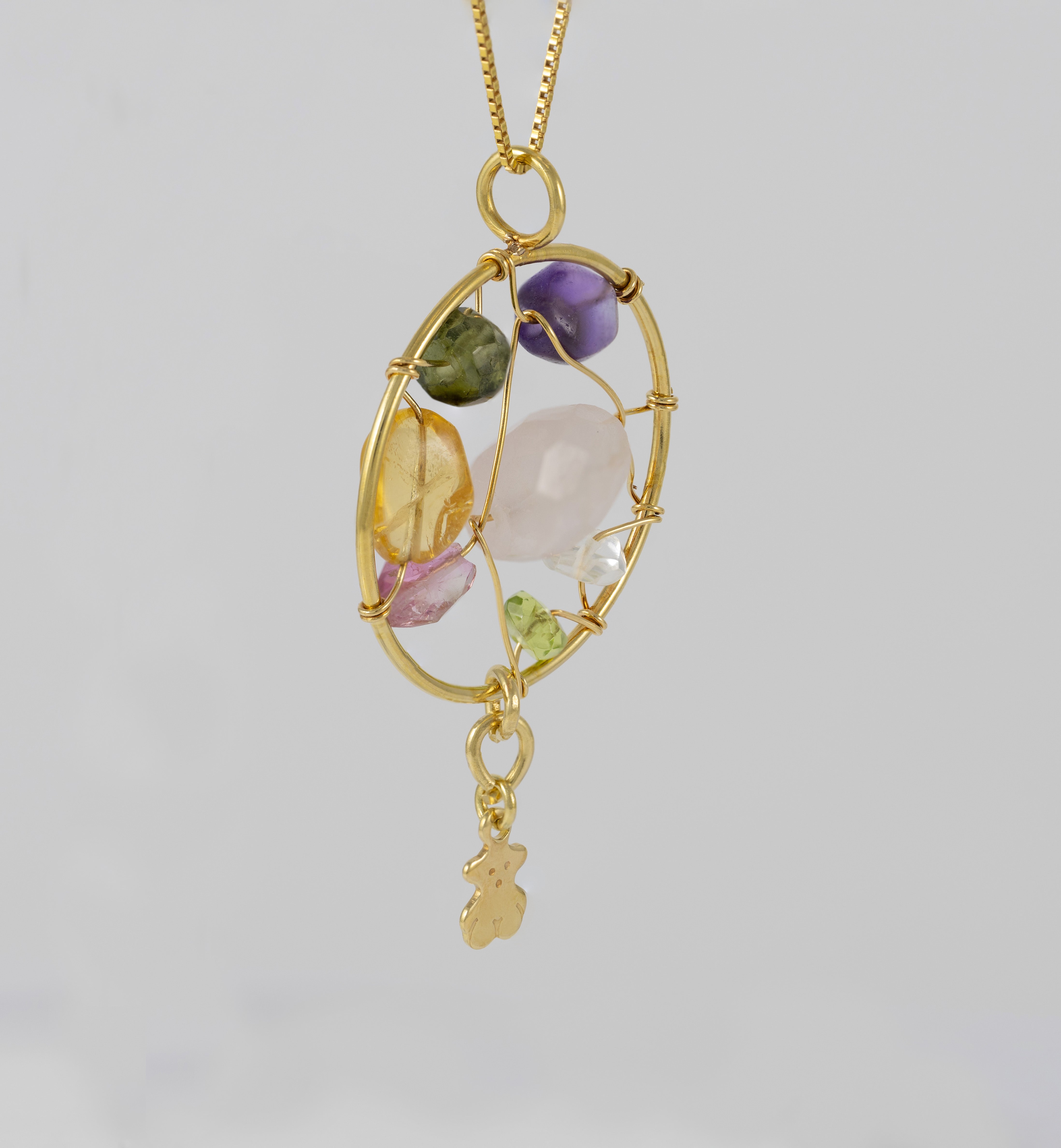 Colgante Tous en oro amarillo 18k y gemas Garabato