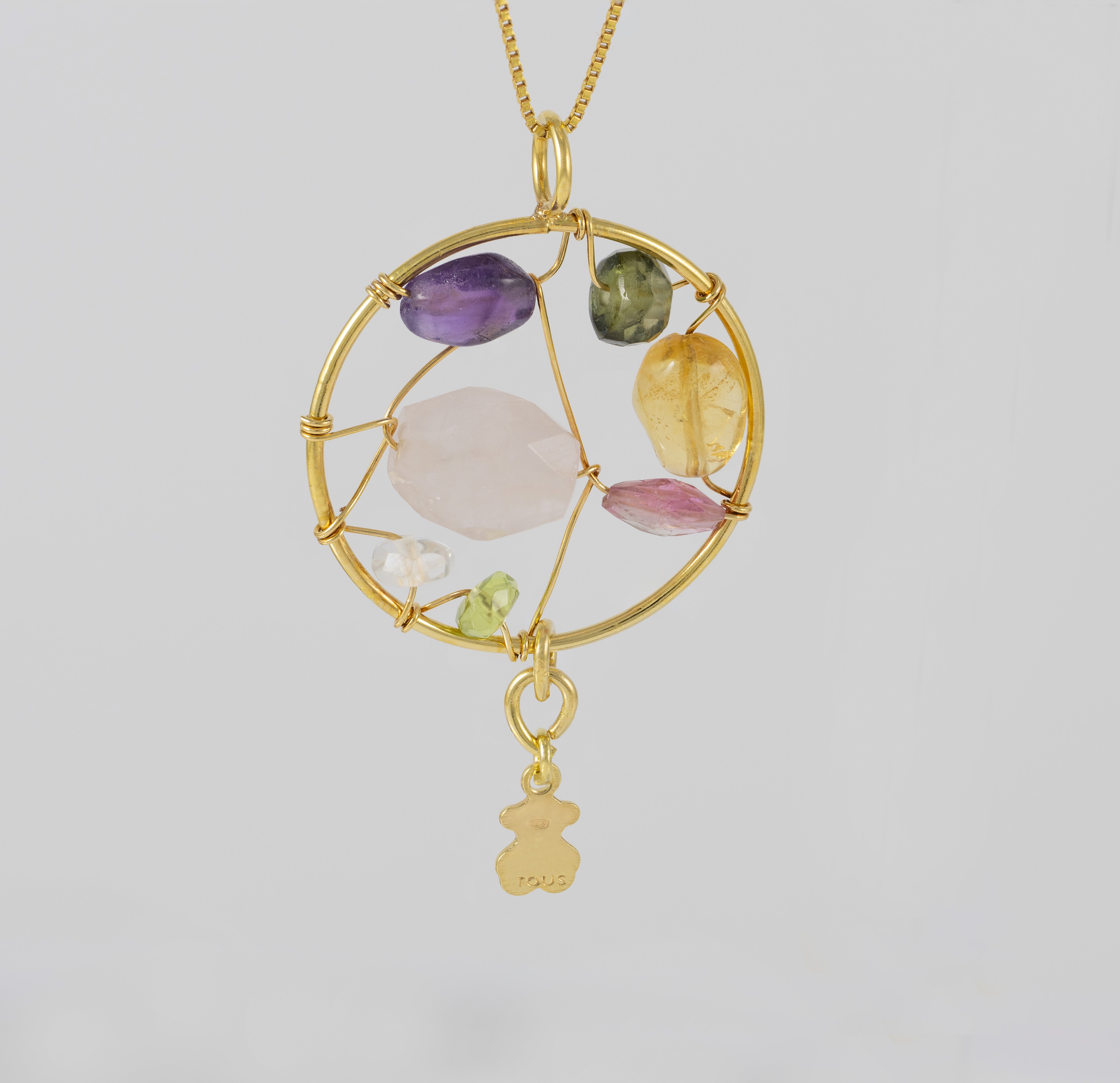 Colgante Tous en oro amarillo 18k y gemas Garabato