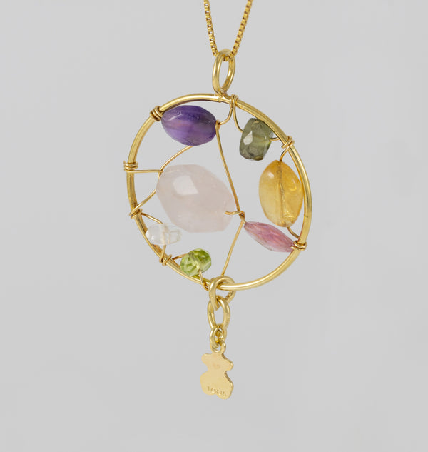 Colgante Tous en oro amarillo 18k y gemas Garabato