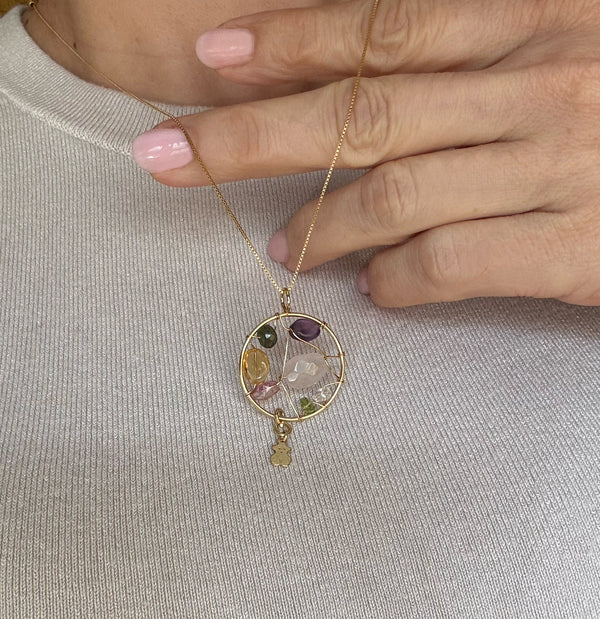 Colgante Tous en oro amarillo 18k y gemas Garabato