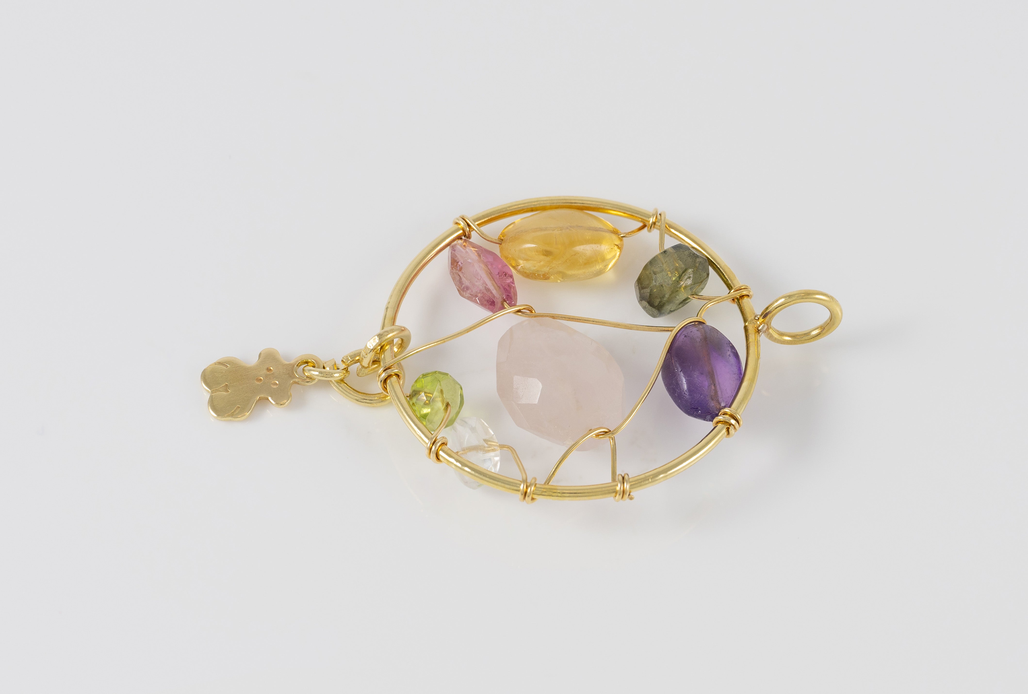 Colgante Tous en oro amarillo 18k y gemas Garabato