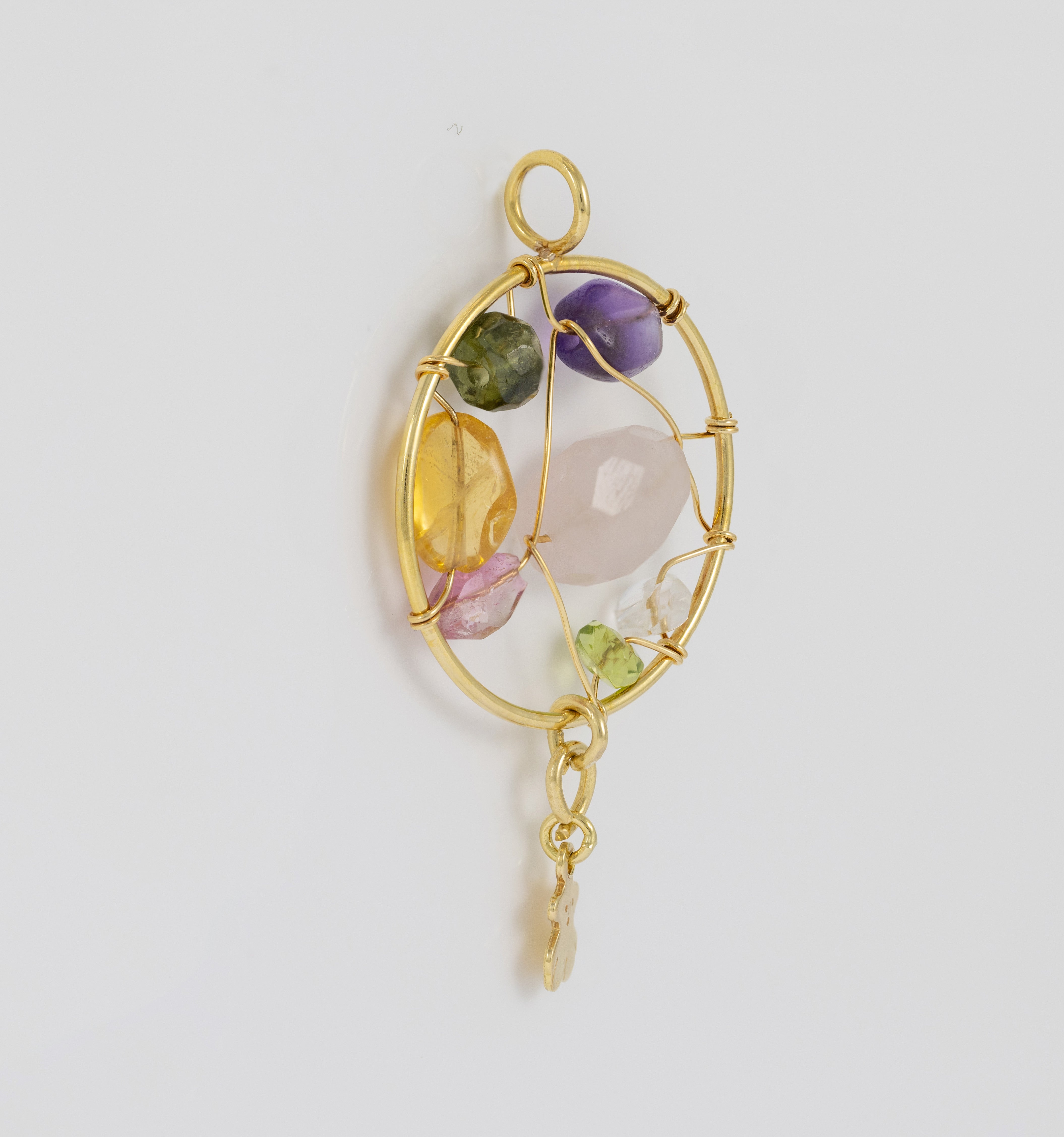 Colgante Tous en oro amarillo 18k y gemas Garabato