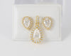 Conjunto de Colgante y Pendientes en oro amarillo 18k y moissanitas