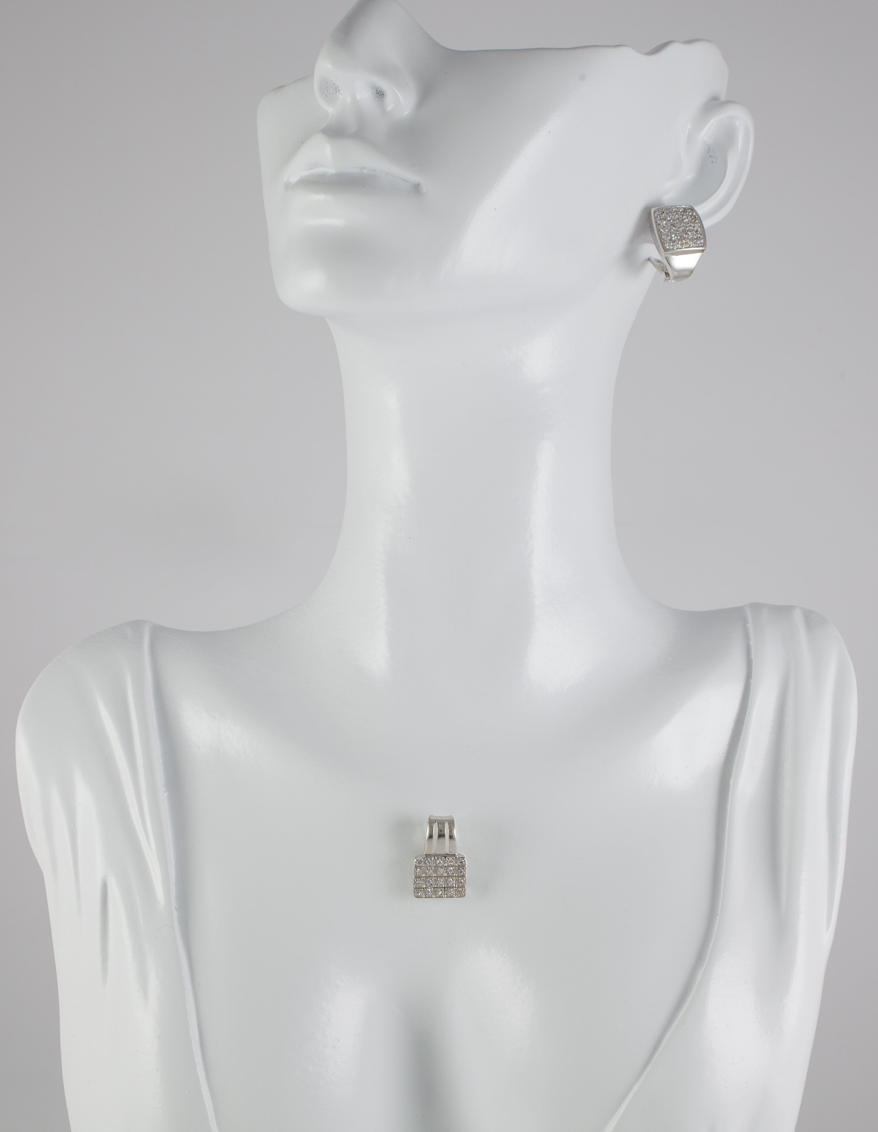 Conjunto pendientes y colgante en oro blanco 18k y brillantes