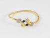 Conjunto Carrera y Carrera Pulsera y Anillo en oro amarillo y blanco 18k brillantes y zafiros