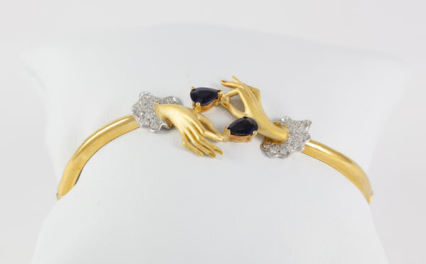 Conjunto Carrera y Carrera Pulsera y Anillo en oro amarillo y blanco 18k brillantes y zafiros