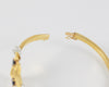 Conjunto Carrera y Carrera Pulsera y Anillo en oro amarillo y blanco 18k brillantes y zafiros