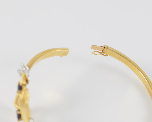 Conjunto Carrera y Carrera Pulsera y Anillo en oro amarillo y blanco 18k brillantes y zafiros