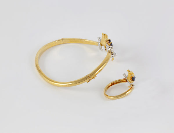 Conjunto Carrera y Carrera Pulsera y Anillo en oro amarillo y blanco 18k brillantes y zafiros