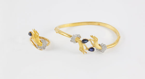 Conjunto Carrera y Carrera Pulsera y Anillo en oro amarillo y blanco 18k brillantes y zafiros