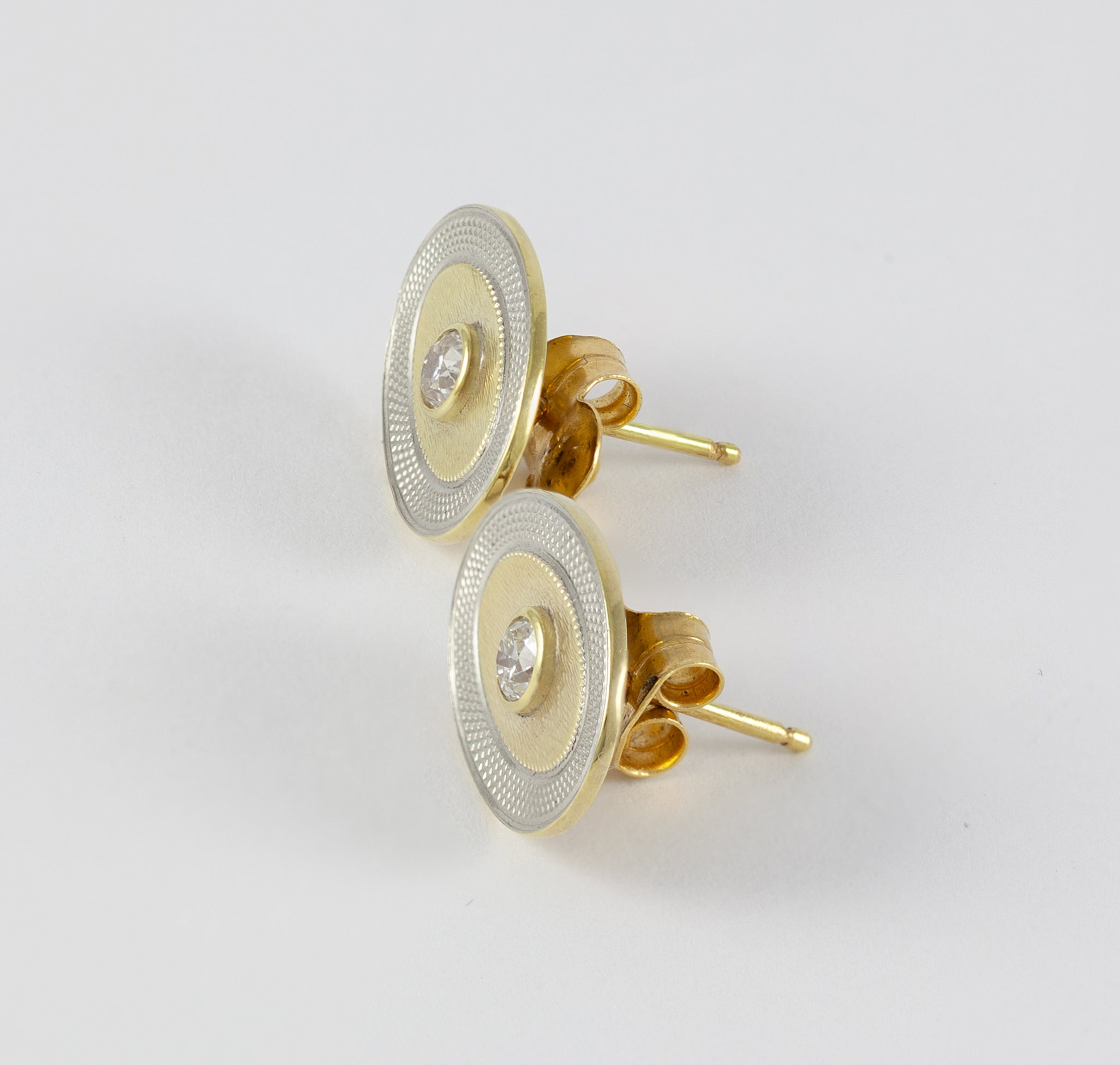 Pendientes en oro amarillo y blanco 18k con diamantes