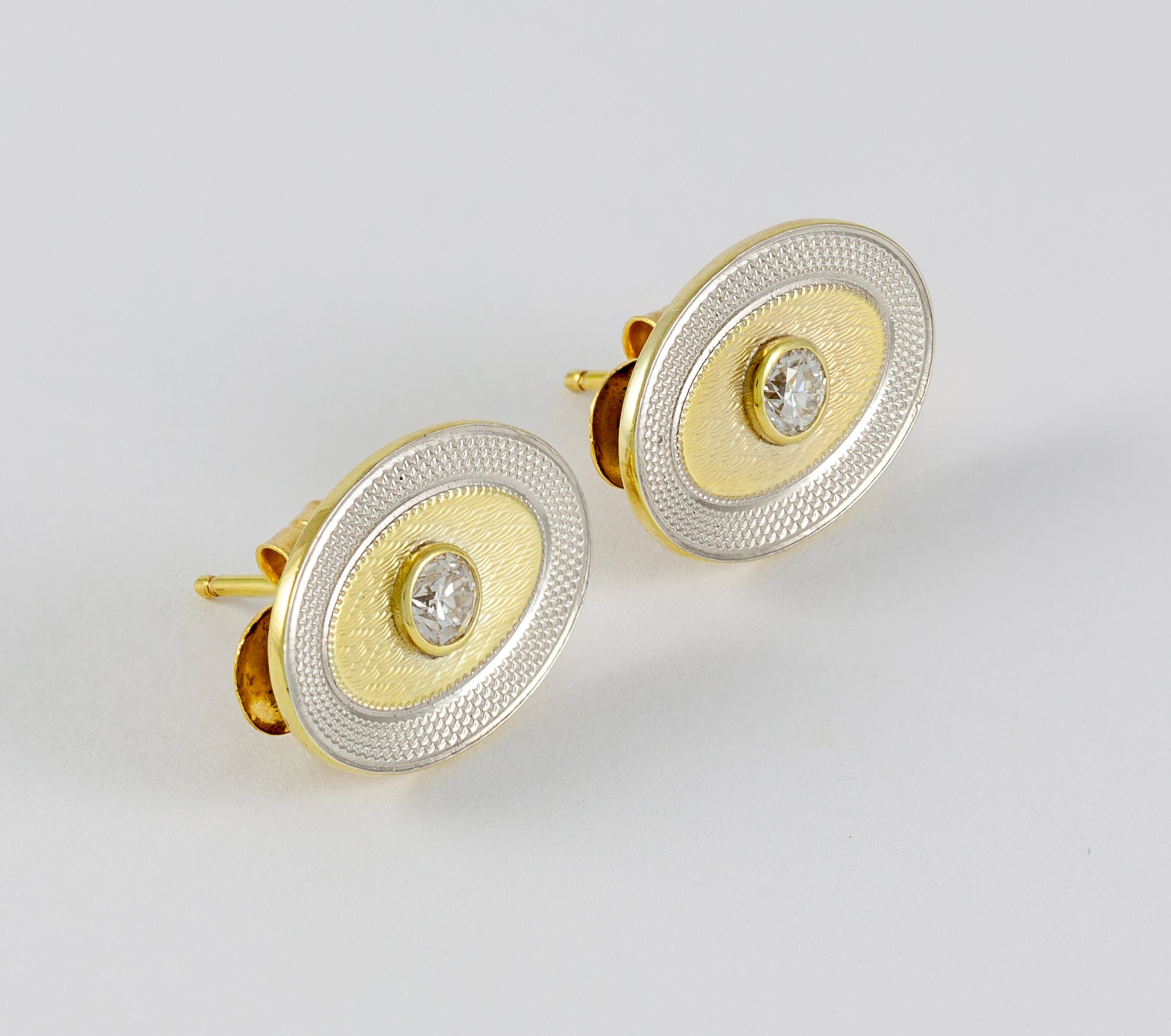 Pendientes en oro amarillo y blanco 18k con diamantes