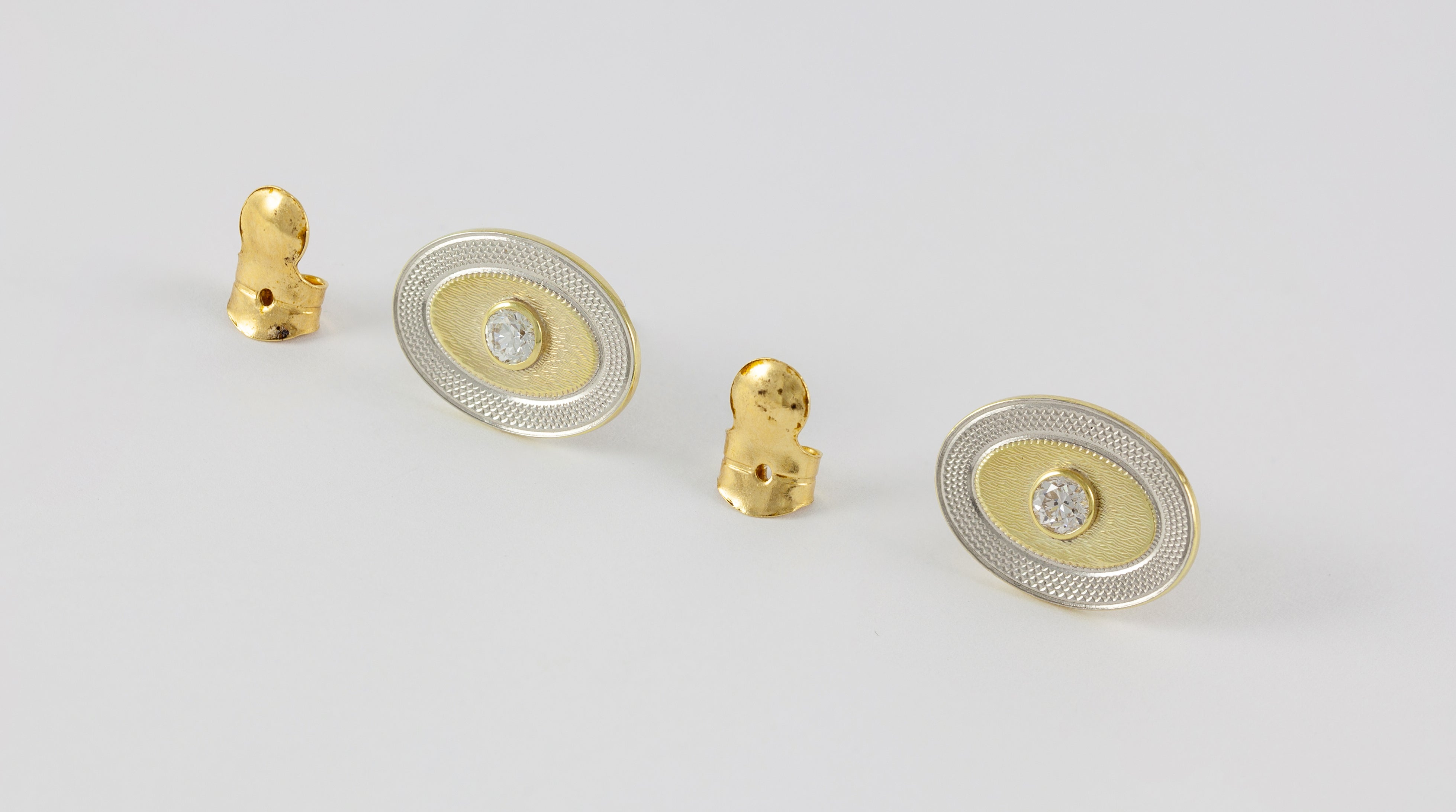 Pendientes en oro amarillo y blanco 18k con diamantes