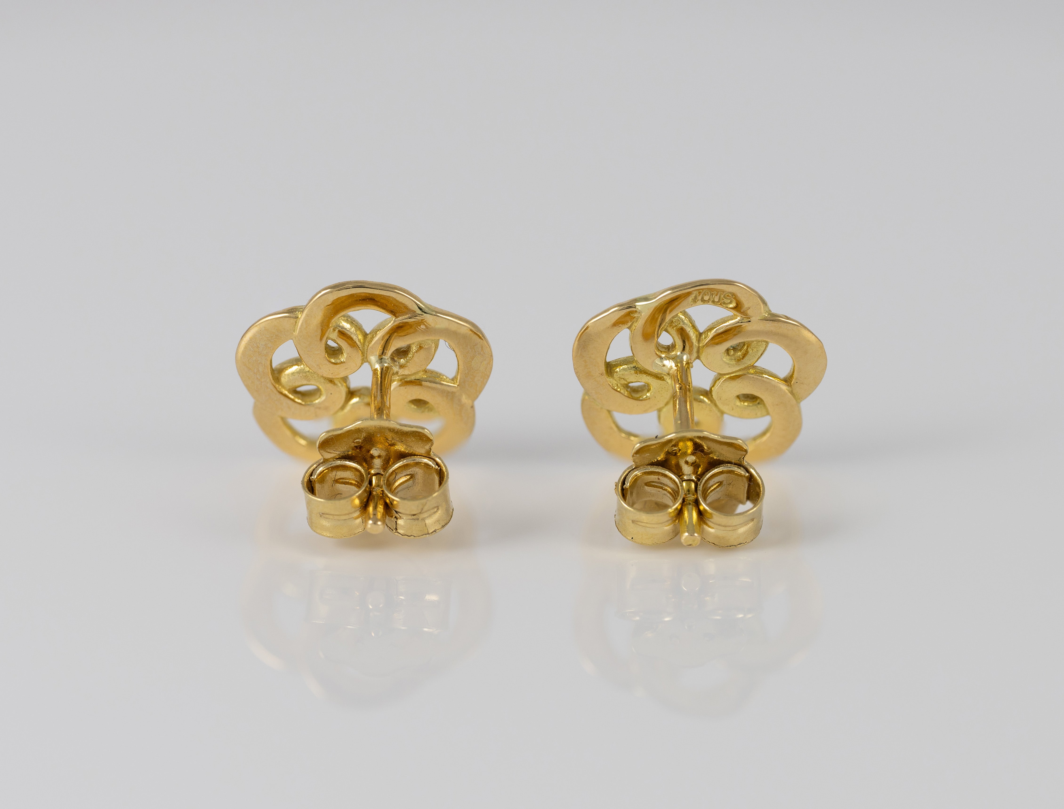 Pendientes Tous Flor en oro amarillo 18k