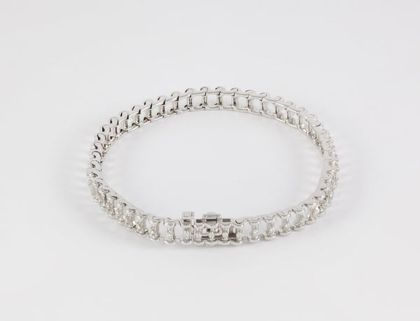 Pulsera en oro blanco 18k y brillantes