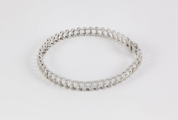 Pulsera en oro blanco 18k y brillantes