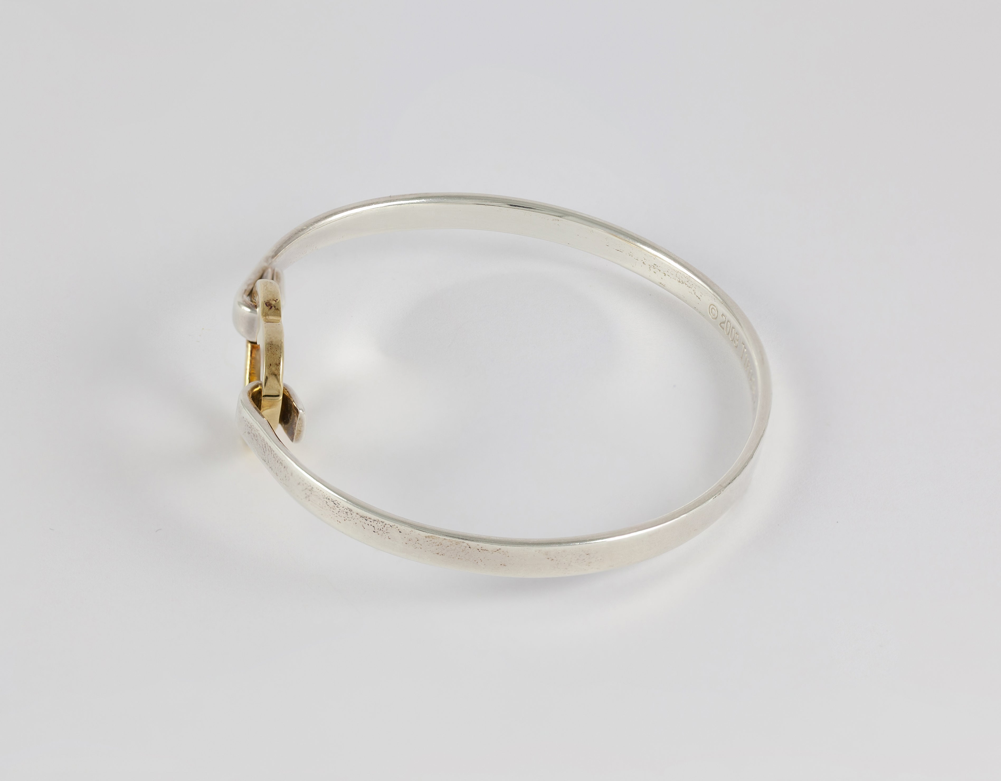Brazalete Tiffany de plata 925 y oro amarillo 18k