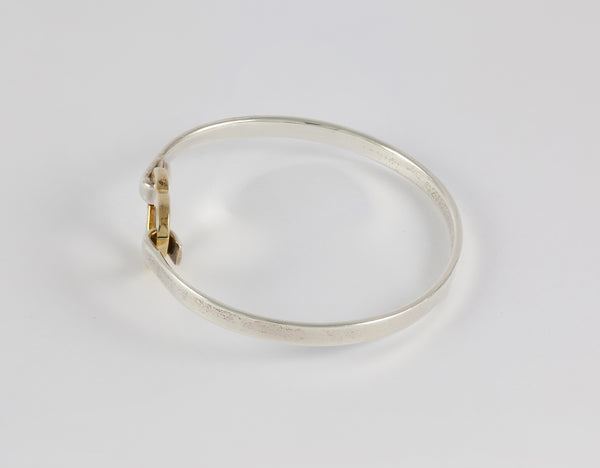 Brazalete Tiffany de plata 925 y oro amarillo 18k
