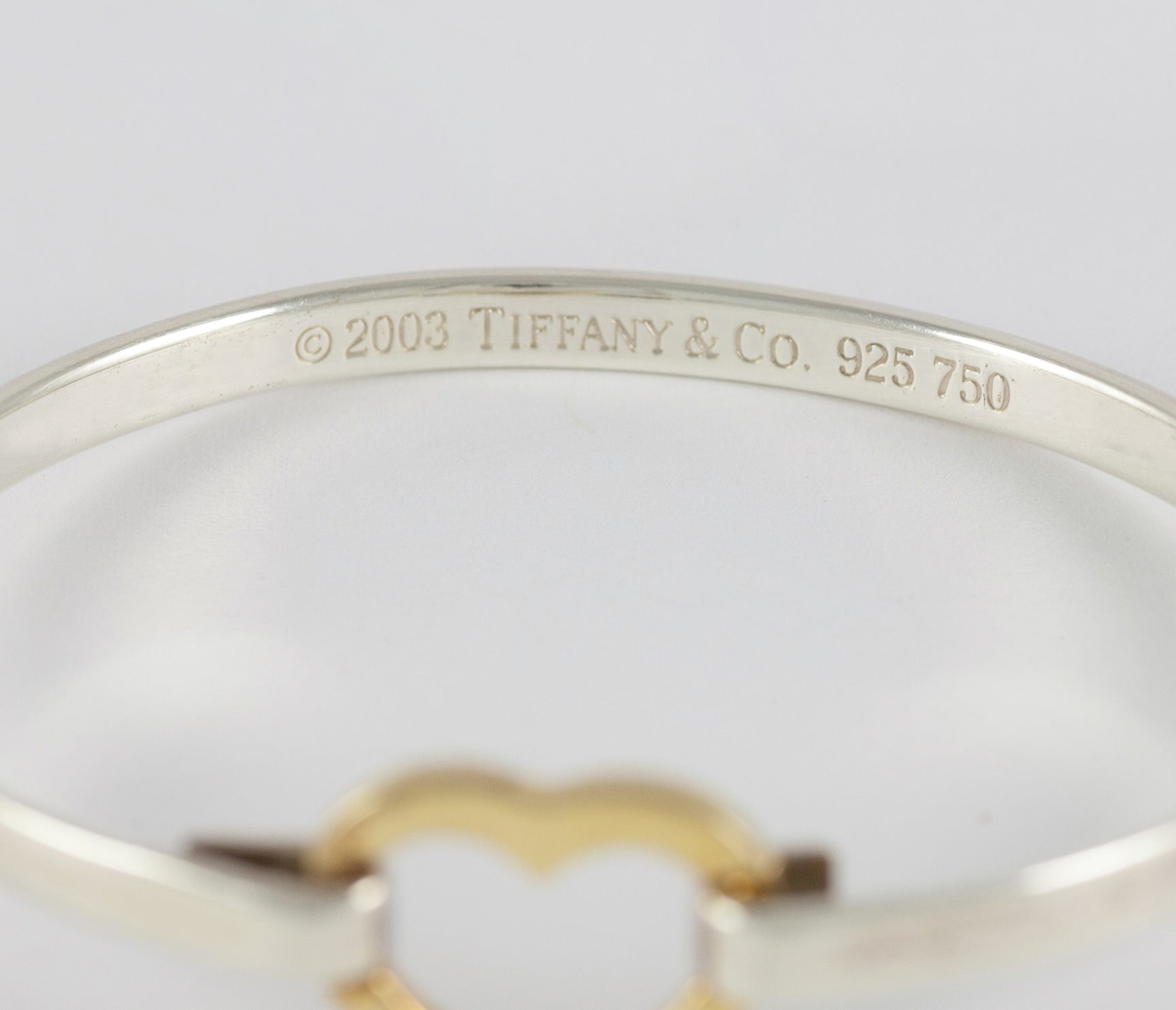 Brazalete Tiffany de plata 925 y oro amarillo 18k