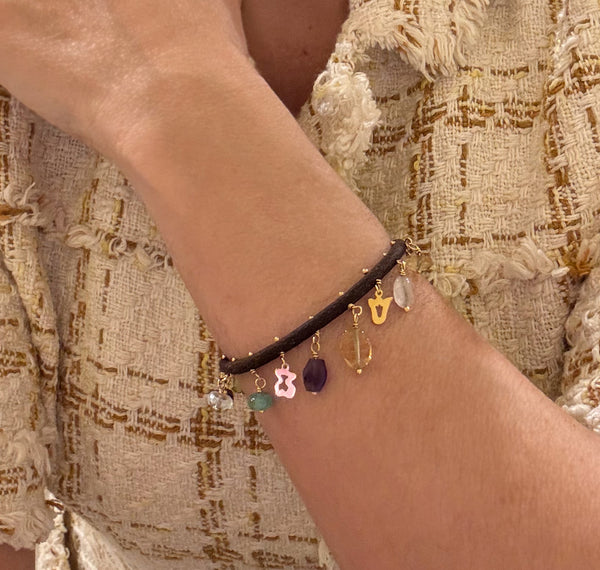 Pulsera Tous de cuero con motivos en oro amarillo 18k y gemas
