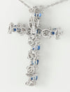 Colgante cruz en oro blanco 18k con zafiros y diamantes - Mayka Jewels