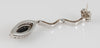 Pendientes en oro blanco 18k con brillantes y ónix central - Mayka Jewels